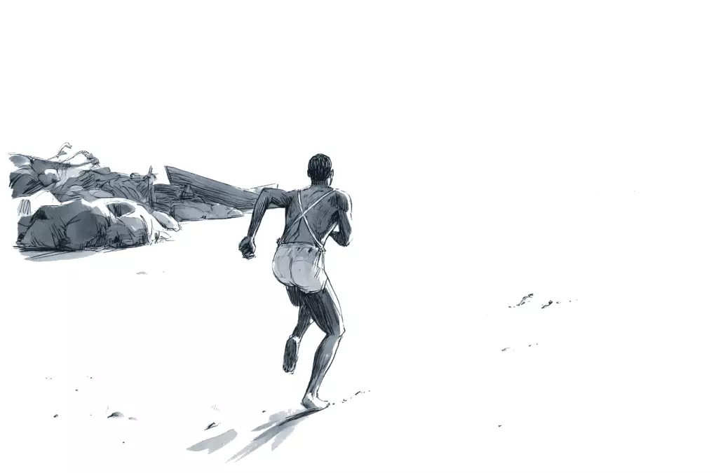 Homme en short courant pieds nus sur une étendue de sable clair, rochers à l'arrière-plan, photo en noir et blanc.